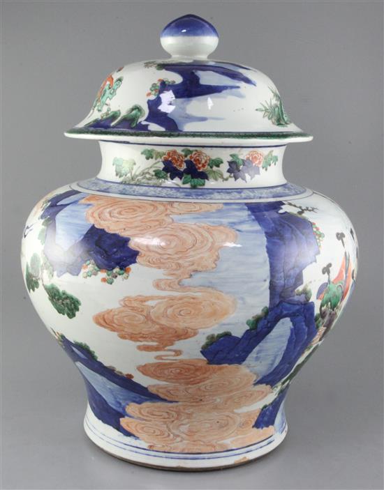 A massive Chinese wucai baluster jar and cover, early Kangxi period, c.1670, approx. height 50cm width 37cm, slight faults